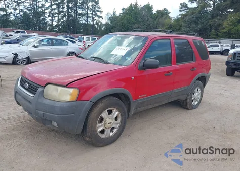 2001 Ford Escape Xlt z USA, uszkodzony, nr VIN 1FMYU031X1KF93444